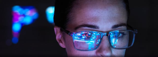 Close-up of a woman's face wearing glasses